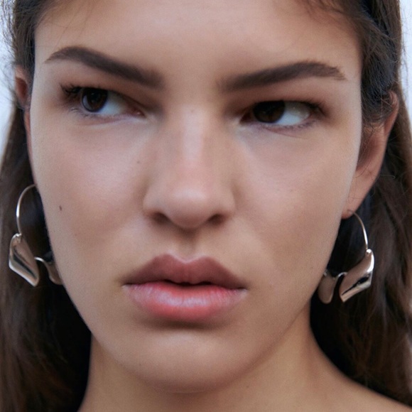 Any 3/$25! Silver Twisted Ribbon Hoop Earrings - Picture 3 of 8